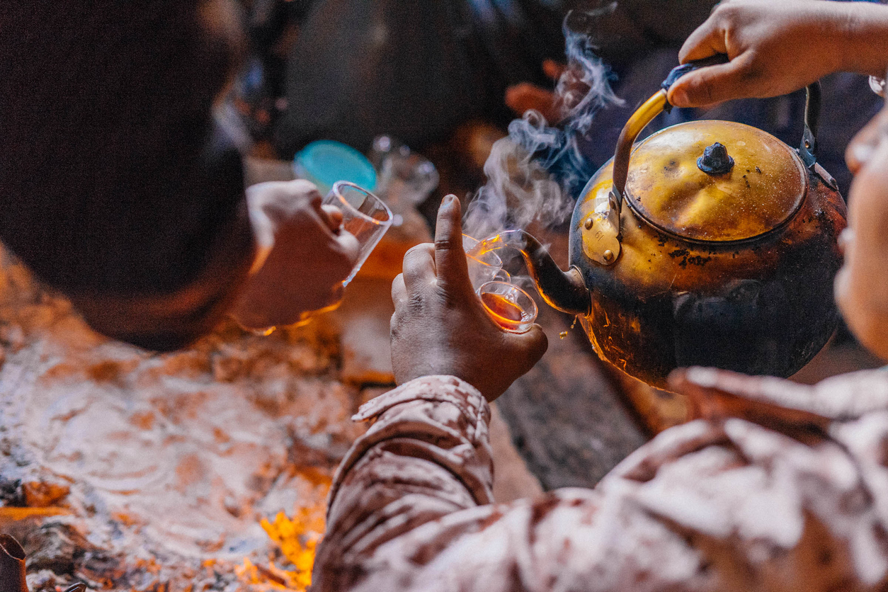 Bedouin man pouring traditional tea