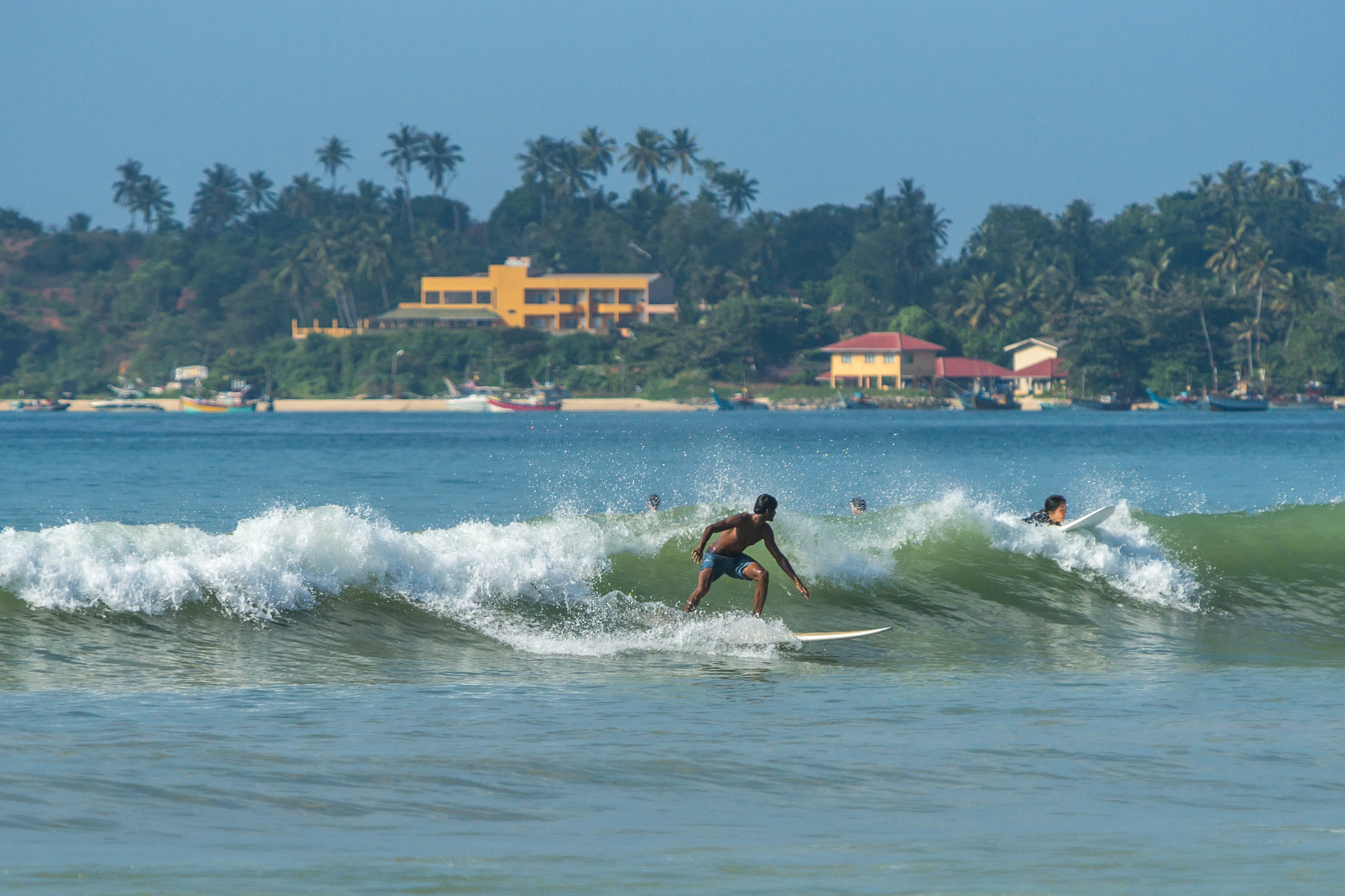 Learning to Surf in Weligama