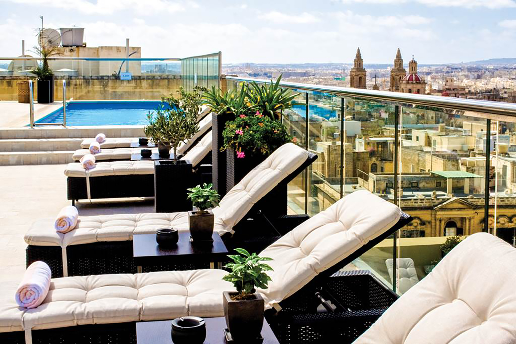 Relax by the pool in the Hotel