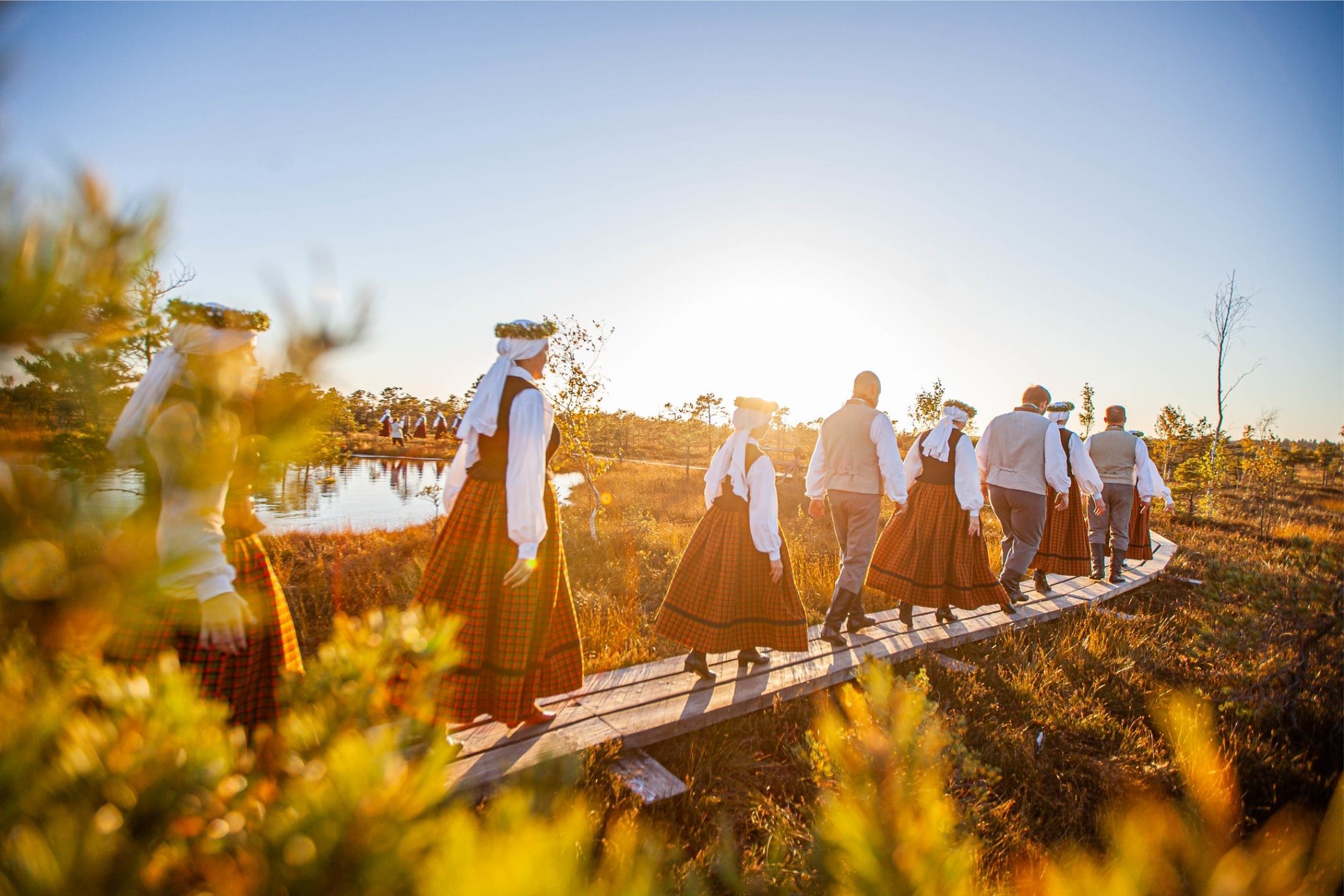 Latvian traditional folk dancers in Ķemeri bog - Artis Veigurs