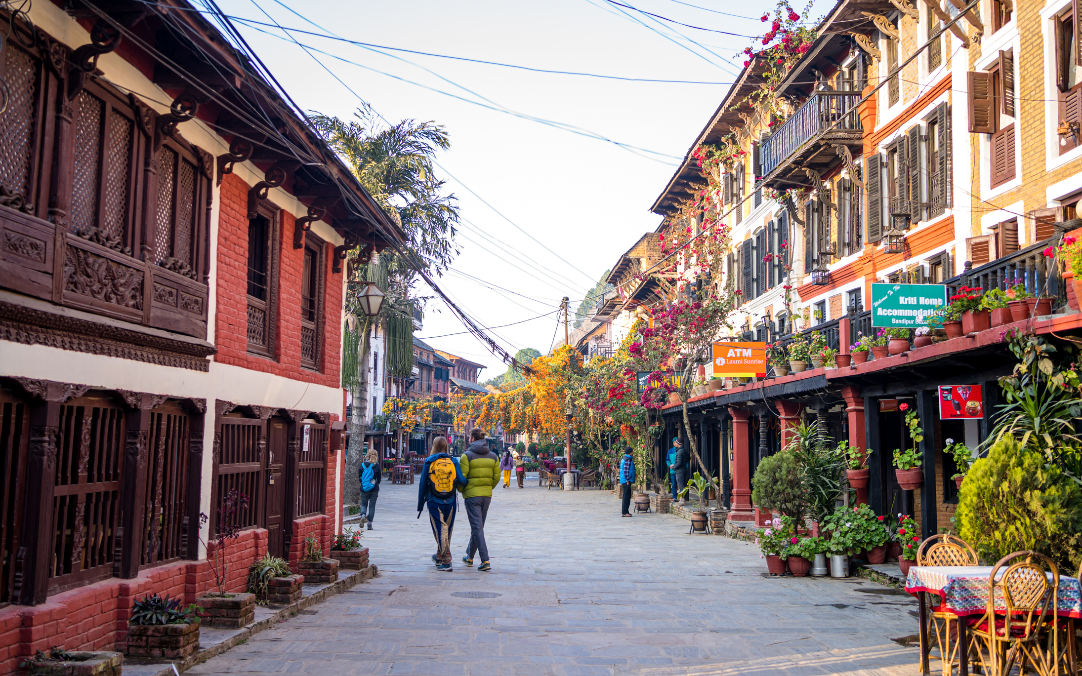 Tourists enjoy walking along the traditional streets of Bandipur